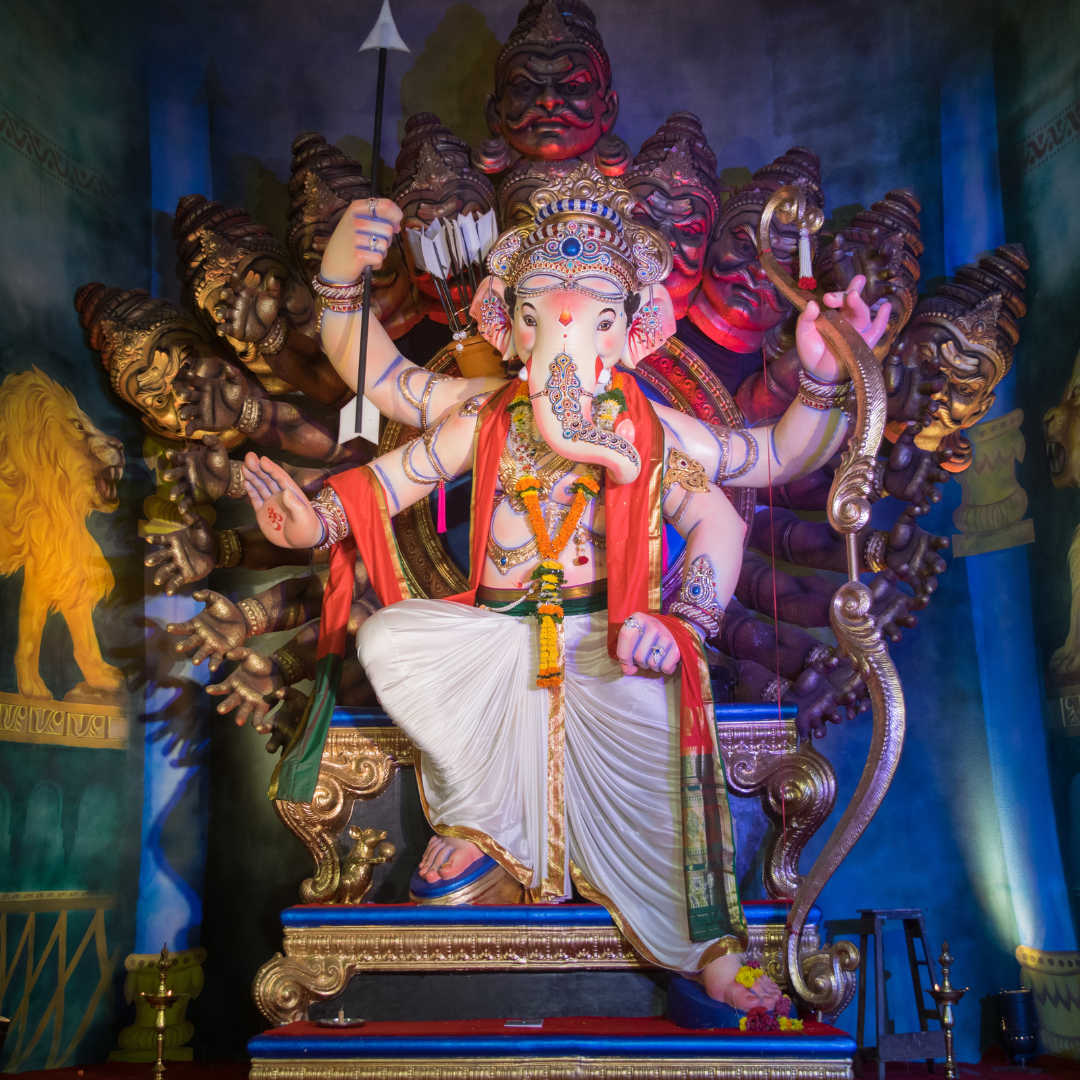 A vibrant and intricately decorated idol of Lord Ganesha.